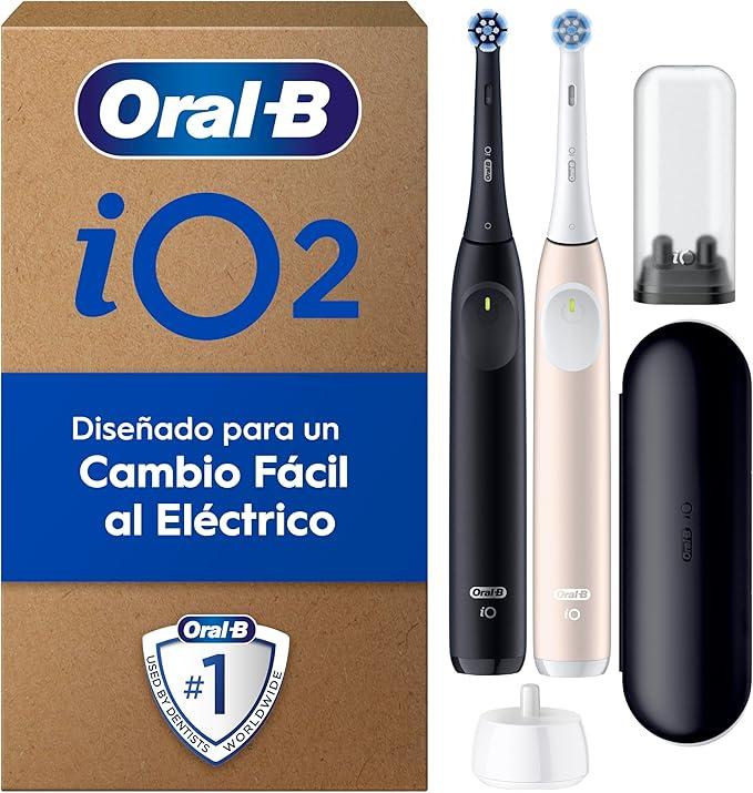 Oral-B iO 2 Pack de 2 Cepillos de Dientes Eléctricos Negro Noche y Rosa Suave, 2 Cabezales, 1 Estuche de Viaje, 1 Portarrecambios, 3 Modos De Cepillado, Sensor De Presión y Temporizador